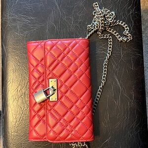 Red Kurt Geiger London Mini Brixton with chain. 5.5” H x 2.25” D x 7.5” W